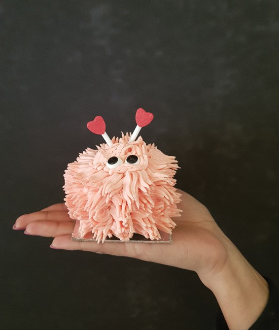 Pink lovebug cupcake