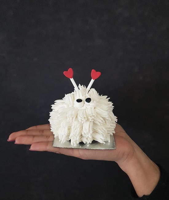 White lovebug cupcake