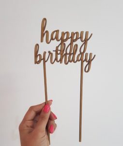 "Happy birthday" laser-cut topper