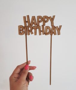 "Happy birthday" laser-cut topper