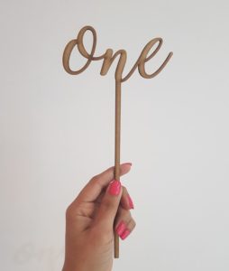 "one" laser-cut topper