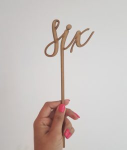 "six" laser-cut topper