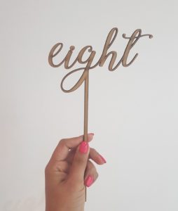"eight" laser-cut topper