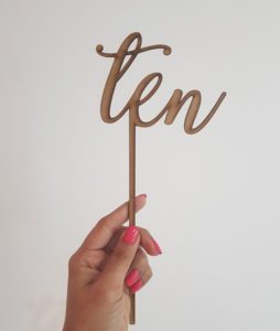 "ten" laser-cut topper