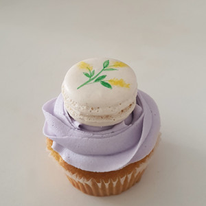 Yellow floral macaron cupcake