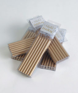 Tall gold candles