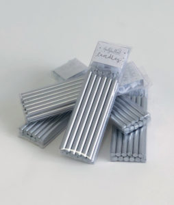 Tall silver candles