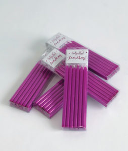 Tall metallic purple candles