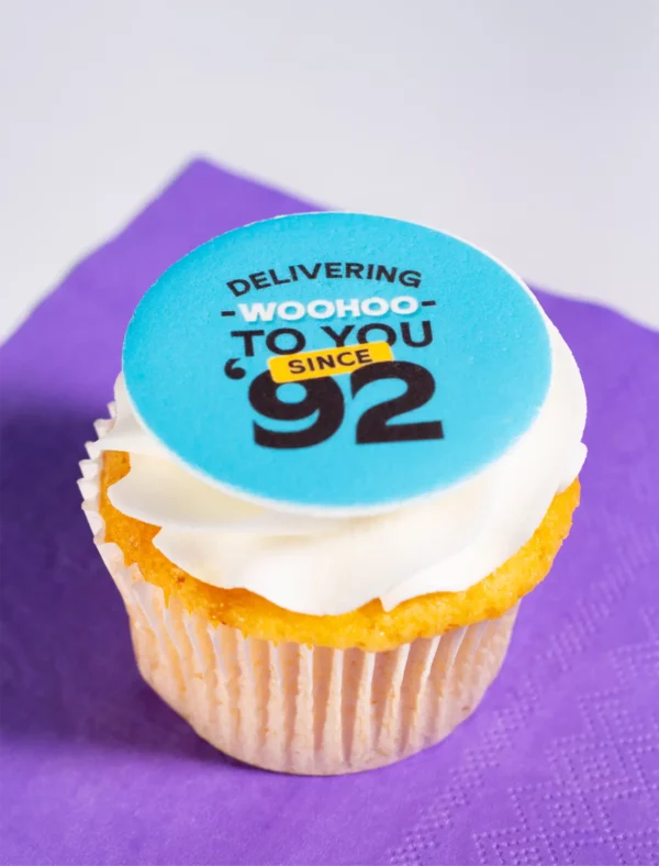 Personalised cupcakes that are branded and created by OhMyCake.