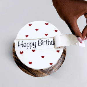 Peel & Reveal 15cm cake with Happy Birthday being revealed